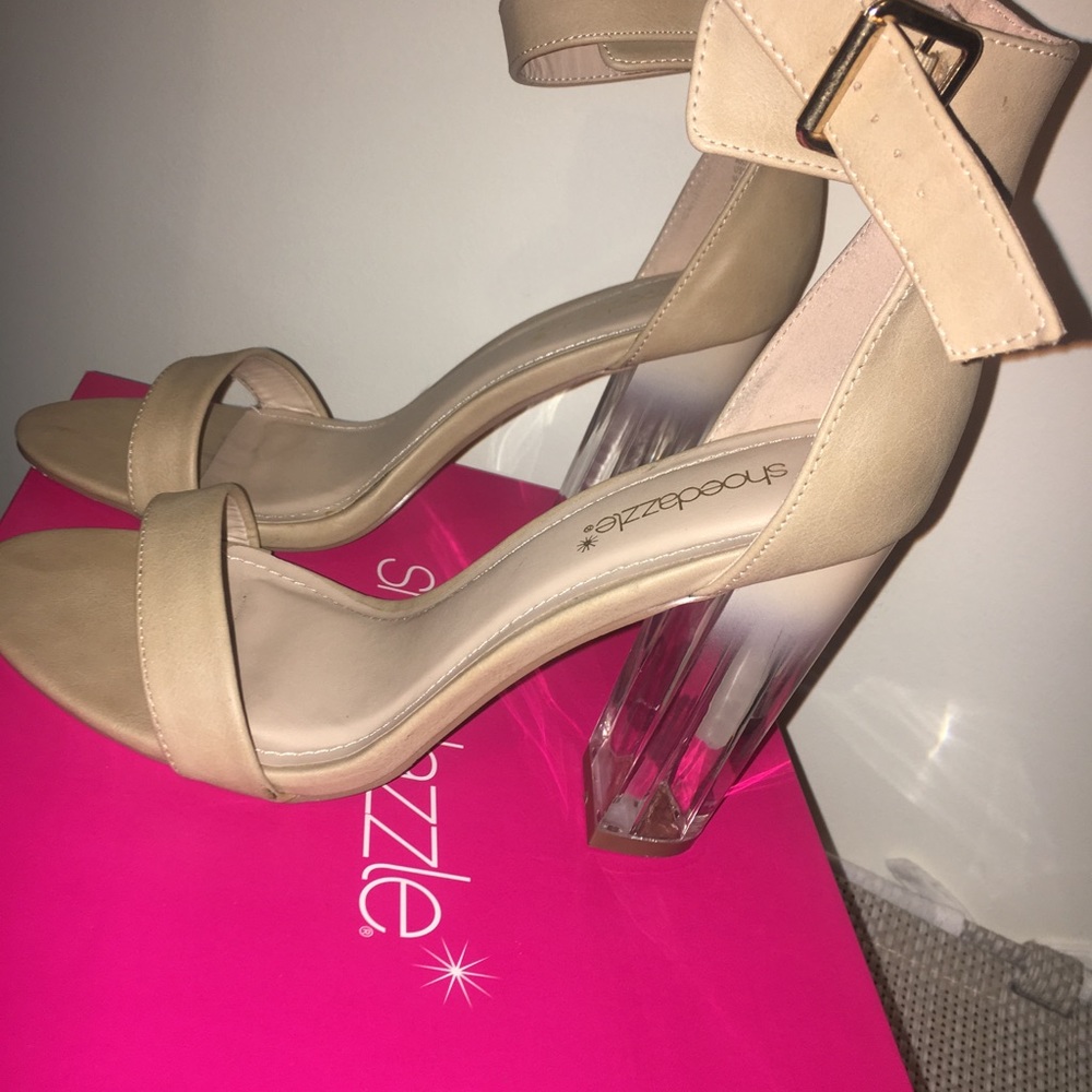 Nude open toe pumps w/ a clear heel! ( worn once)